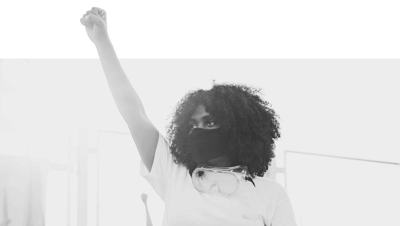 Woman of color with raised fist